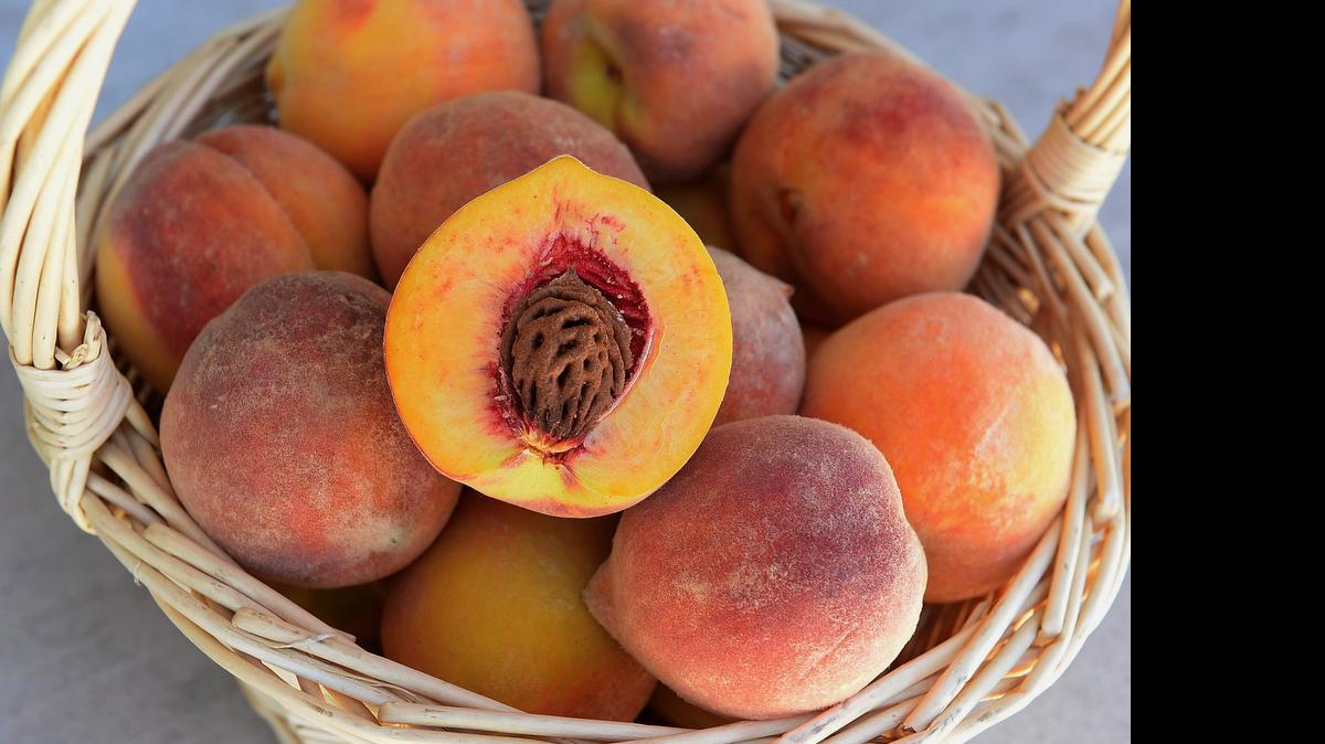 
Enzo’s Table, a fruit stand at Willow and Shepherd in Clovis, is among the vendors who sell Elberta, Fay Elberta and Fayette peaches. 
