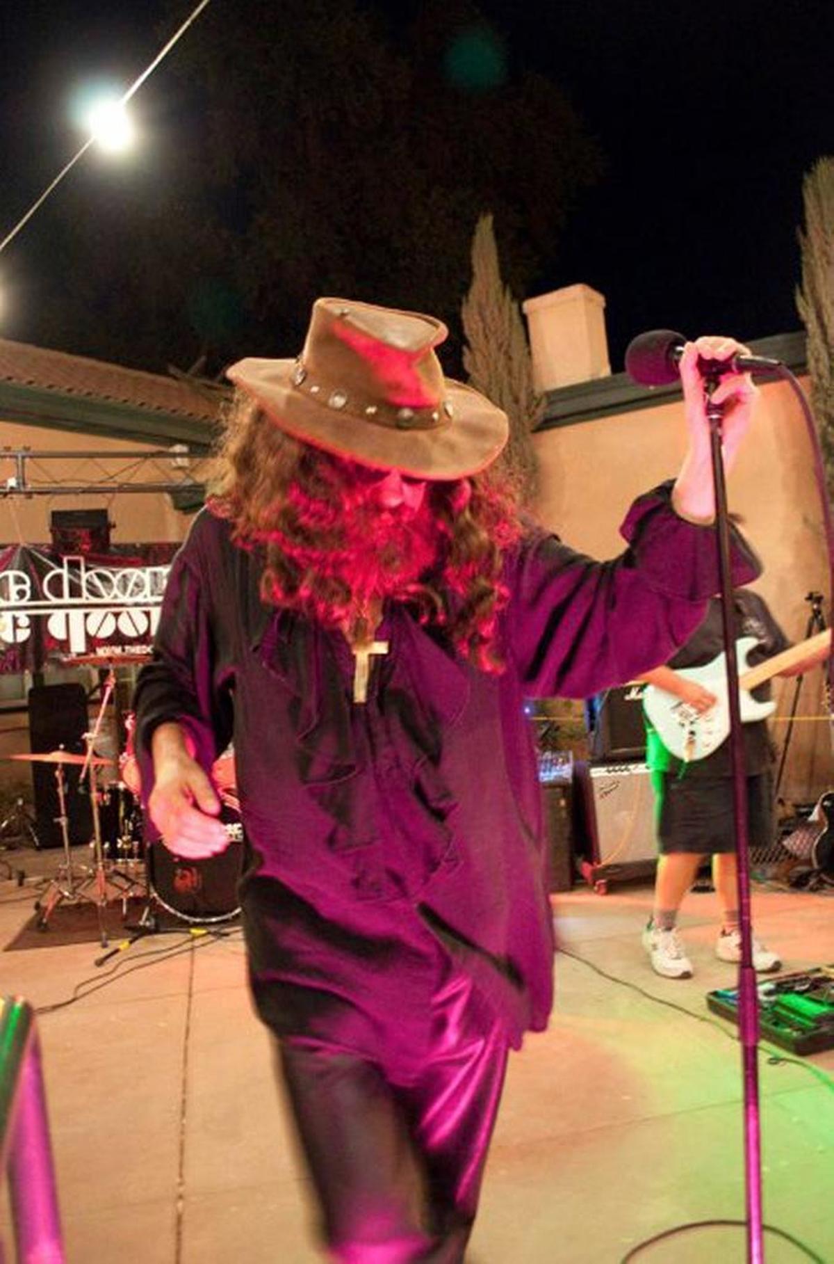 ApCal features live, local music. Here, Nate Butler as Jim Morrison in the band Double Doors performs at the Madera County winery.