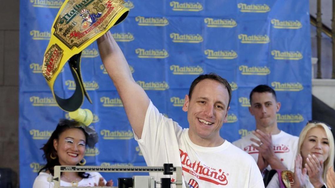 Eight-time men’s champion Joey Chestnut, of San Jose, Calif., holds holds his championship belt during the weigh-in for the 2017 Nathan’s Hot Dog Eating Contest, in Brooklyn Borough Hall, in New York, Monday, July 3, 2017. Chestnut weighed-in at 221.5 pounds.