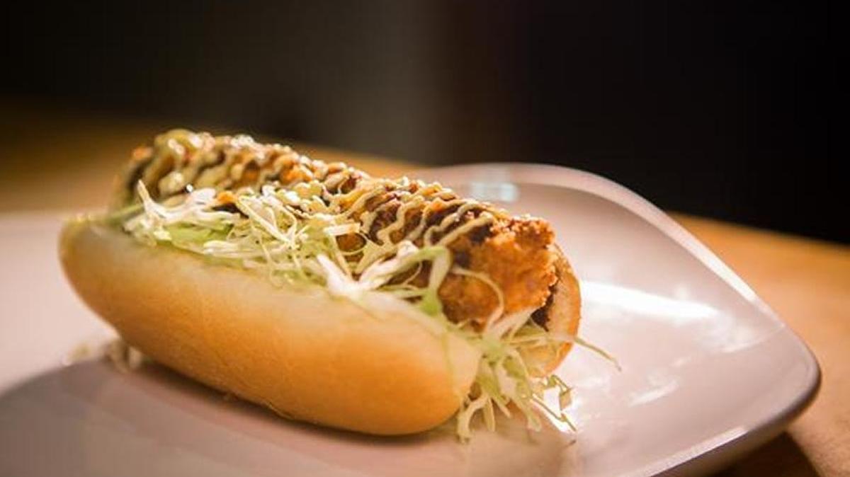 The katsu dog is on the menu at the Ginza Food Bazaar, set for Sunday, Oct. 25, 2015. It’s a hot dog coated in panko bread crumbs, deep-fried and topped with cabbage and various sauces.
