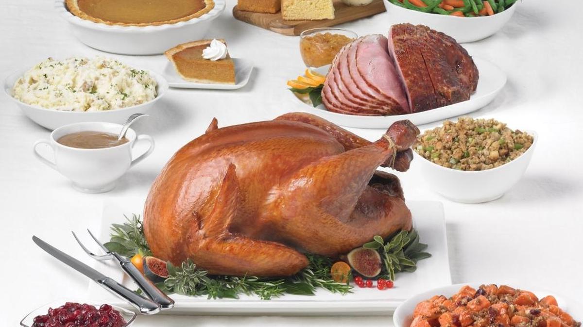 Marie Callender’s sells take-home feasts like this turkey and ham meal that includes sides and dessert.