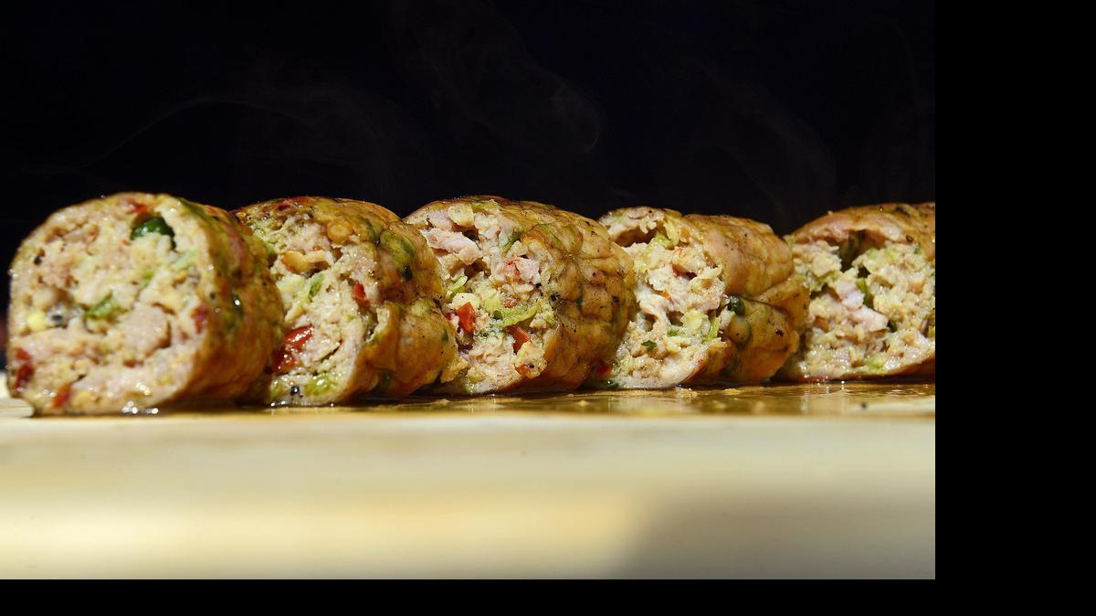 
Chicken jalapeno sausage is sliced up and ready to seve at The Meat Market in Clovis, Friday, May 8, 2015. The sausage was developed exclusively by The Meat Market and is their top-seller.

