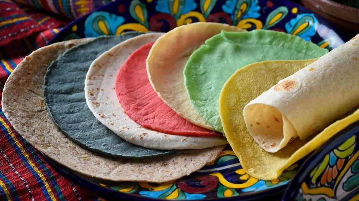 A colorful assortment of tortillas offered locally from left, whole wheat flour (La Tapatia), blue corn (Vallarta), small flour fajita (Sol de Oro), red chili corn (Vallarta), white corn (Vallarta), cactus corn (Vallarta), yellow corn (Mission) and large flour (La Tapatia).