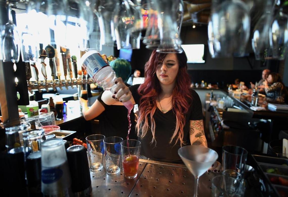 Brit Collins of Colton’s Social House makes a specialty drink in this file photo from 2016.