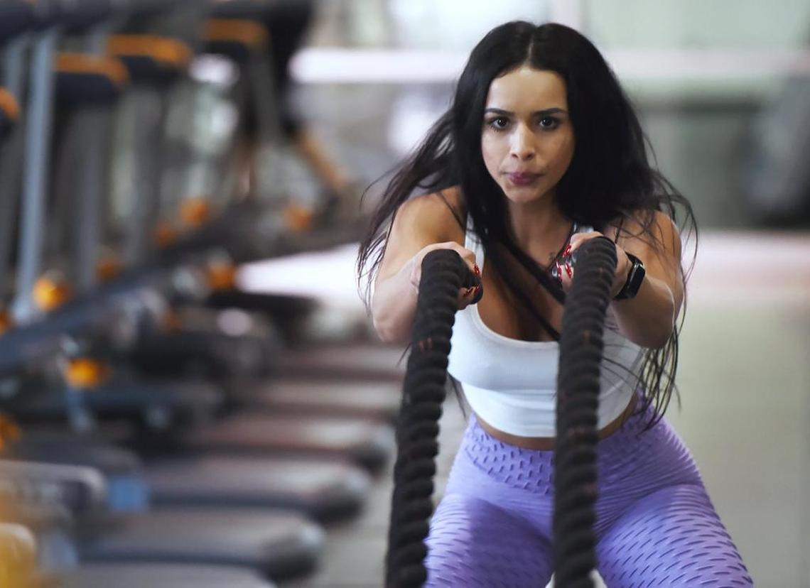 Mercedes Fernandez works out with the battle ropes at GB3 Saturday morning, Jan. 5, 2019 in Clovis. Fernandez, 20, started Sadie’s Ladies, a community of over 100 members, to support women body builders.