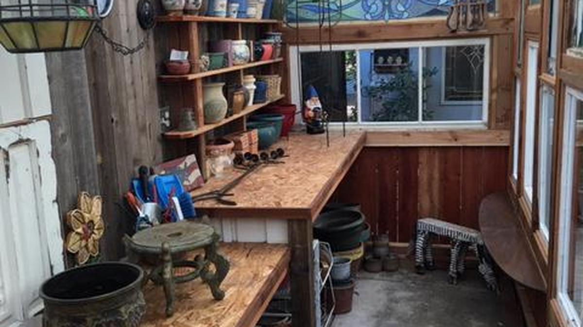 Vicki Collier McDonald built this greenhouse/potting shed from recycled items.