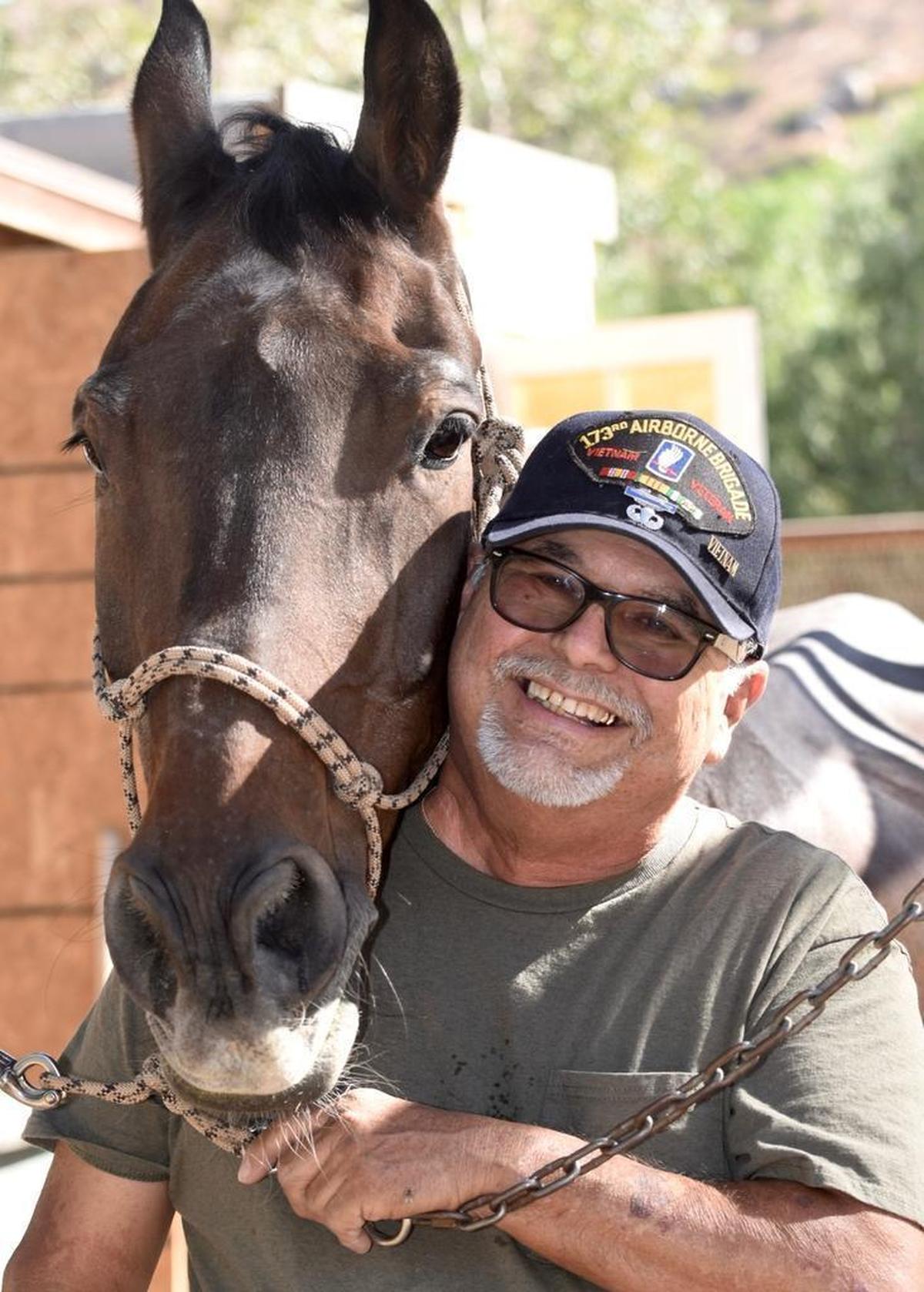 Manuel Blunt with his horse, Honor.