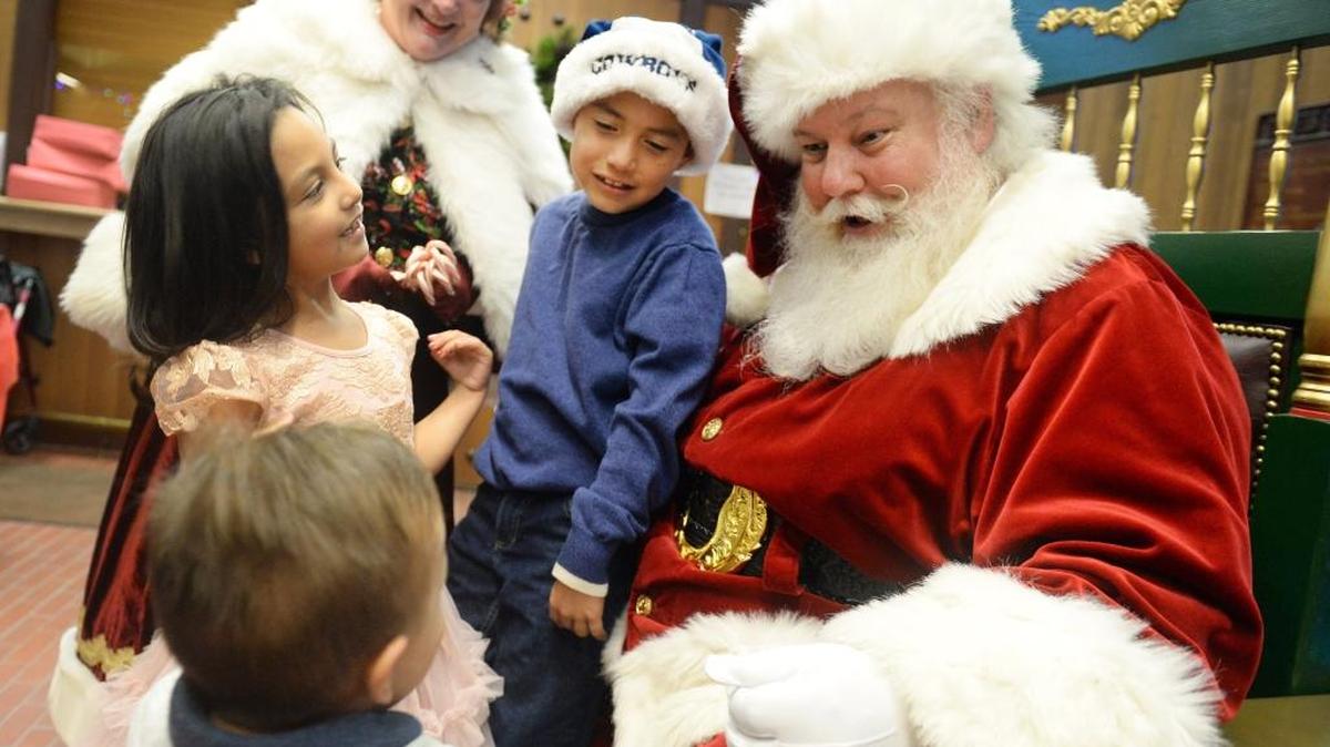 Don’t miss out on your chance to get a picture with Santa Claus. Last year, Santa and Mrs. Claus got a visit from Joseph Valadez, 7, his sister, Nevaeh, 5, and brother, Hercules, 2, all of Fresno, following the lighting of the Clovis Christmas tree at Clovis City Hall on Dec. 5, 2016.