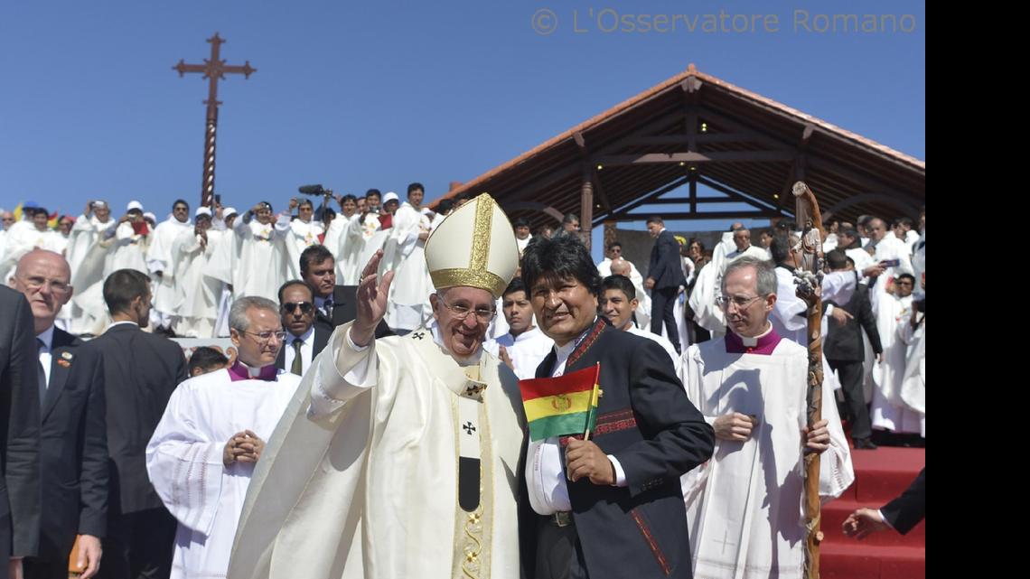 
In this pool photo taken on July 9, 2015 and made available on Friday, July 10, 2015, Pope Francis and Bolivia's President Evo Morales, second right, pose for pictures at Christ the Redeemer square in Santa Cruz, Bolivia. Francis gave a late-afternoon speech to delegates at the gathering. (L'Osservatore Romano/Pool Photo via AP)
