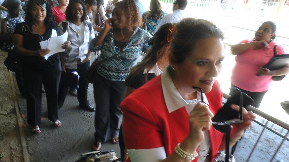 
Dawn Kline waits in line during the The Big Fresno Fair's fourth annual job fair Thursday, August 14, 2014.
