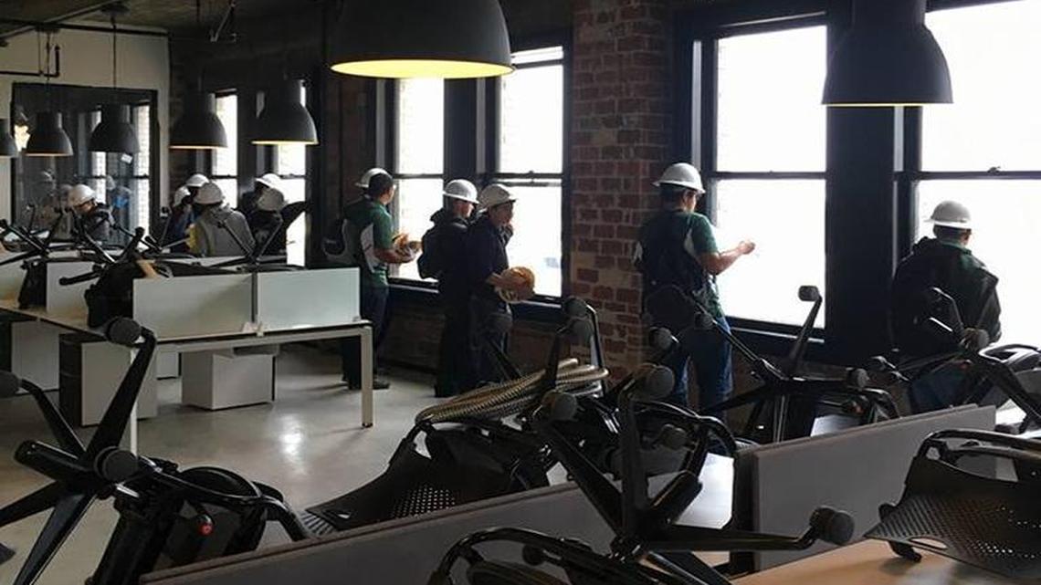 High school students get a look at the almost-completed Workspace, a membership- and tenant-based office space on the third floor of the landmark Pacific Southwest Building on Fulton Street in downtown Fresno. A grand opening is set for Thursday, Nov. 3.