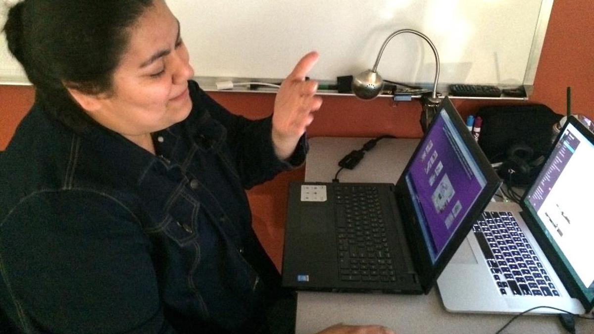 
Rachel Calderon of Fresno shows off a Web page that she and classmates designed five weeks into a six-month Web development class at GeekWise Academy for CalWORKS public-assistance clients in Fresno County.
