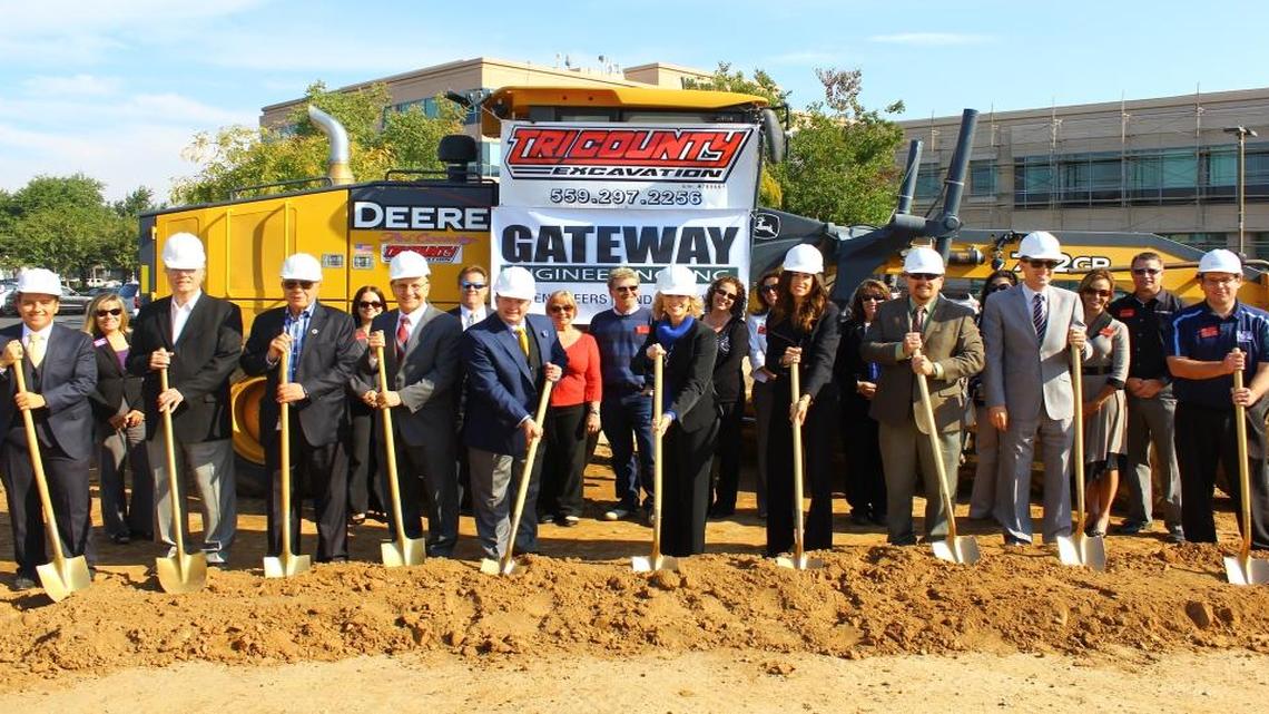 Fresno Mayor Ashley Swearengin, center, members of the Fresno City Council and other dignitaries break ground Thursday at the north Fresno construction site for Dave & Buster’s. the much anticipated bar, restaurant and arcade is expected to open sometime in 2016.