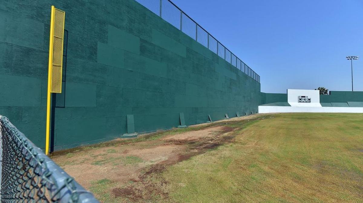 A stadium wall has a fresh coat of green paint as work has started in phase one of the Granite Park renovation, on Monday, Aug. 29 in Fresno. The developers plan to open the park up for games.