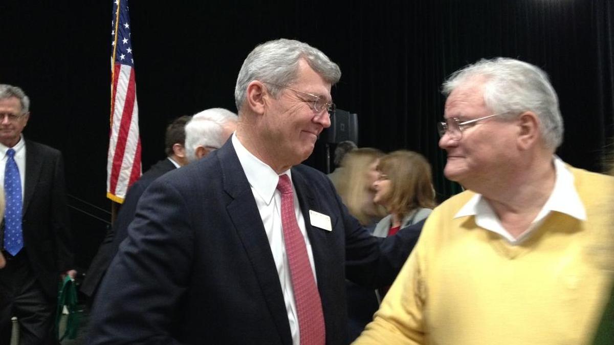 Bill Smittcamp (left), winner of the 2017 Leon S. Peters award, being congratulated Thursday at the Fresno Chamber’s Valley Business Awards Luncheon