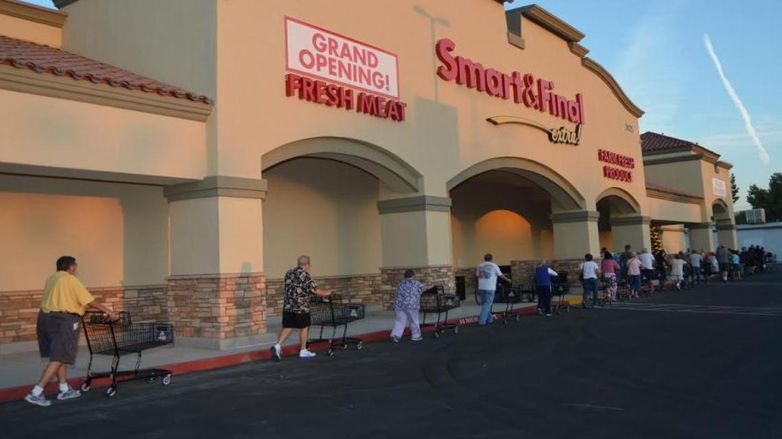 
A line of around 50 people stretched around the Smart & Final Extra store prior to the grand opening Friday, Sept. 25. 
