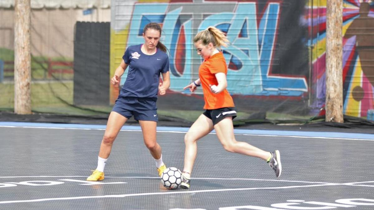 Women play futsal on a field especially for the soccer-like game that has five players on each side. Mellysport Futsal has opened a futsal facility inside Blackbeard’s Family Entertainment Center in Fresno.