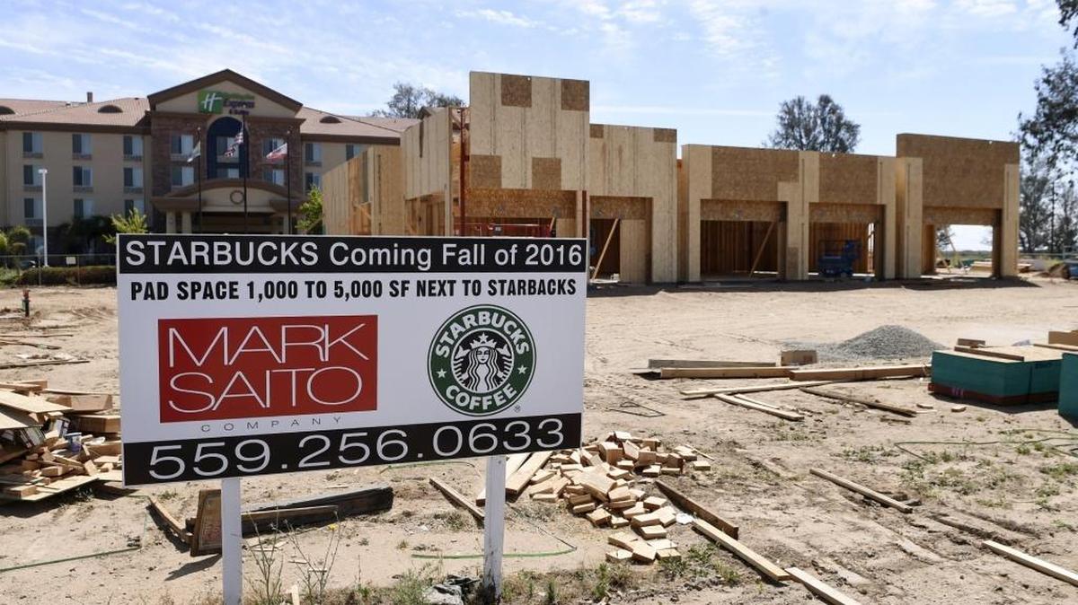 A new Starbucks, top right, is being constructed at Golden State Boulevard and West Kathryn Avenue, one block north of Herndon Avenue near Highway 99 in Fresno.