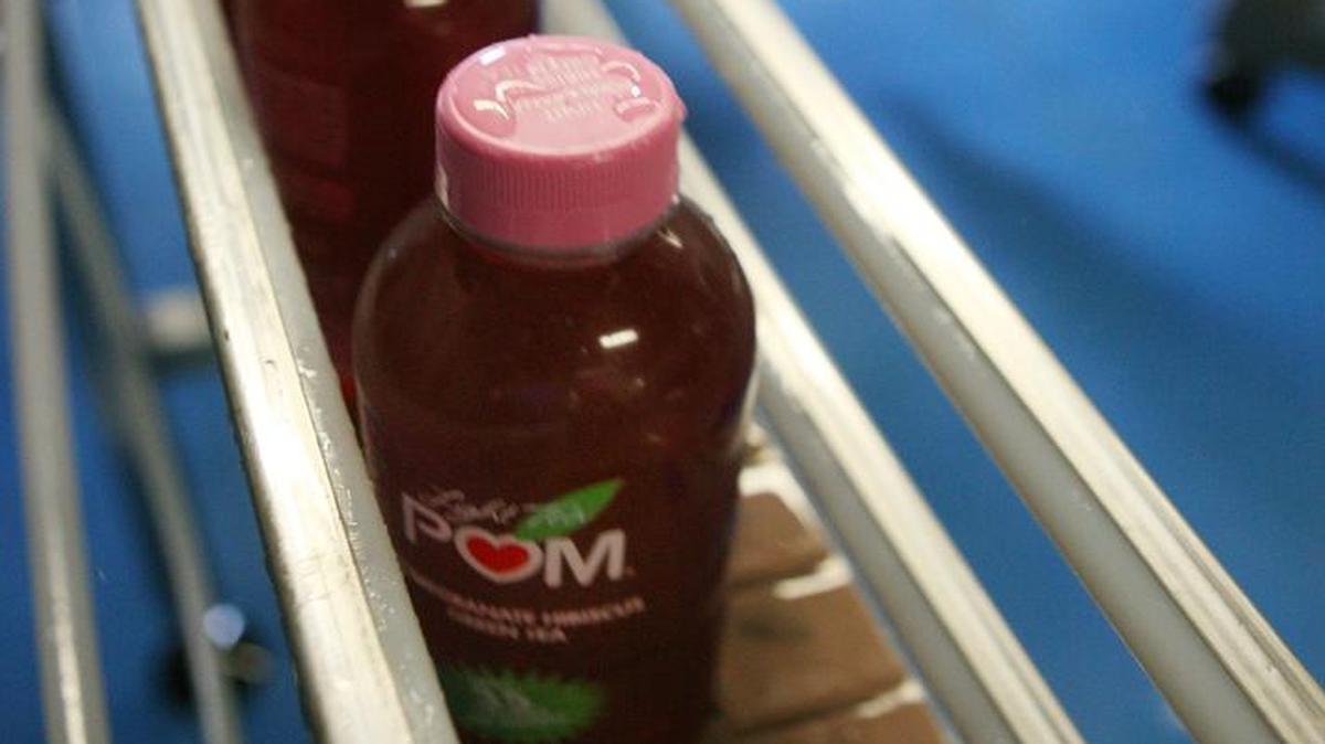 
Pomegranate tea comes off the line at the Pom Wonderful plant in Del Rey. 
