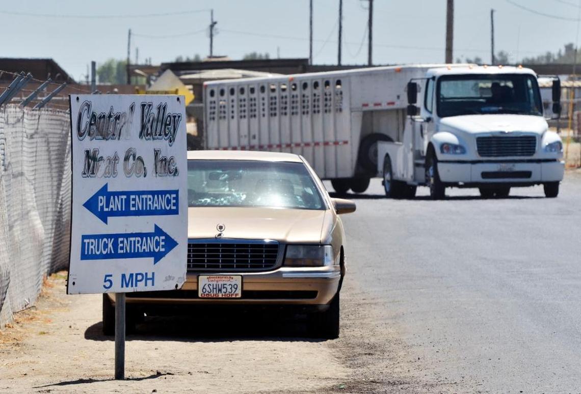 A truck pulling a livestock trailer leaves Central Valley Meat Co. in Hanford, Calif., in a 2012 file photo. The company is buying Coalinga-based Harris Ranch Beef Co. in a sale announced April 9, 2019.