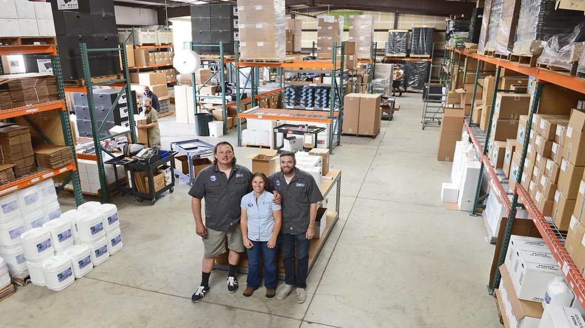 
Current Culture H2O owners, from left, Daniel Wilson and his wife Cheryl, and Christian Long stand in their 10,000 square-foot warehouse in Fresno Wednesday, May 13, 2015. The hydroponics supply company began in 1999 with a 1,000 foot facility in the Tower District and has now branched out into working with commercial agriculture companies. 
