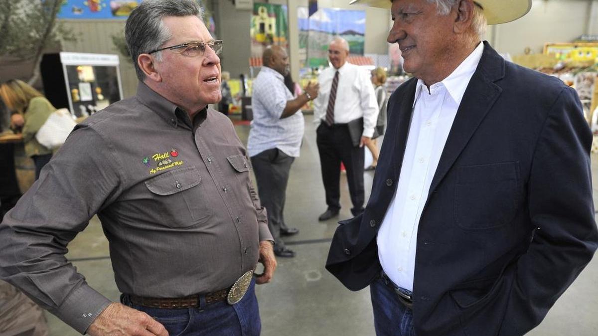
Joe Del Bosque, right, agriculturist of the year, and Earl Hall, owner of Hall Management, winner of the Baker Peterson Franklin’s Ag Business Award, talk at The Big Fresno Fair on Friday, Oct. 9, 2015.
