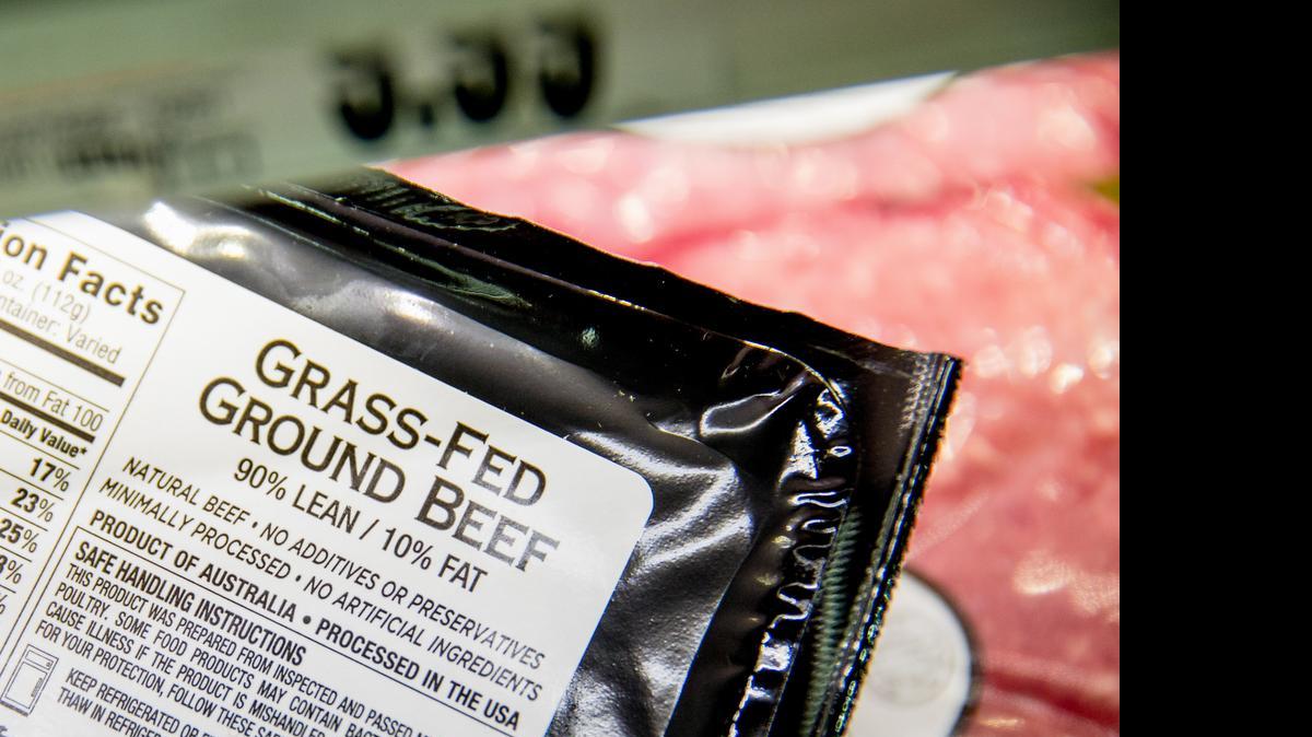 
Meat labels are seen at a grocery store in Washington, Tuesday, May 19, 2015. Labels on packaged steaks and other cuts of meat in the United States that say where the animals were born, raised and slaughtered will have to be dropped or revised after a World Trade Organization ruling.
