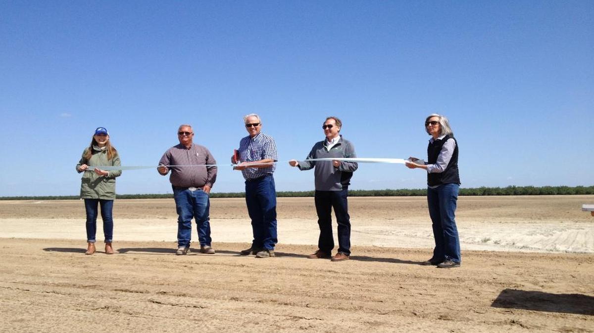 Representatives from the Laguna Irrigation District, Coca-Cola and Sustainable Conservation attend the ribbon-cutting ceremony for the Laguna recharge basin on Friday, May 20.