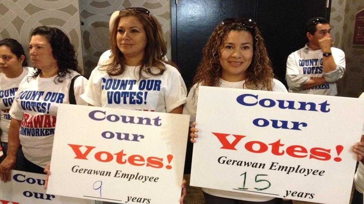 Lourdes Dominguez, middle, was among 200 Gerawan workers who attended a rally at the Radisson Hotel in Fresno. The workers wanted the state's Agricultural Labor Relations Board to count the ballots in an election that would no longer make the United Farm Workers union their bargaining representative.