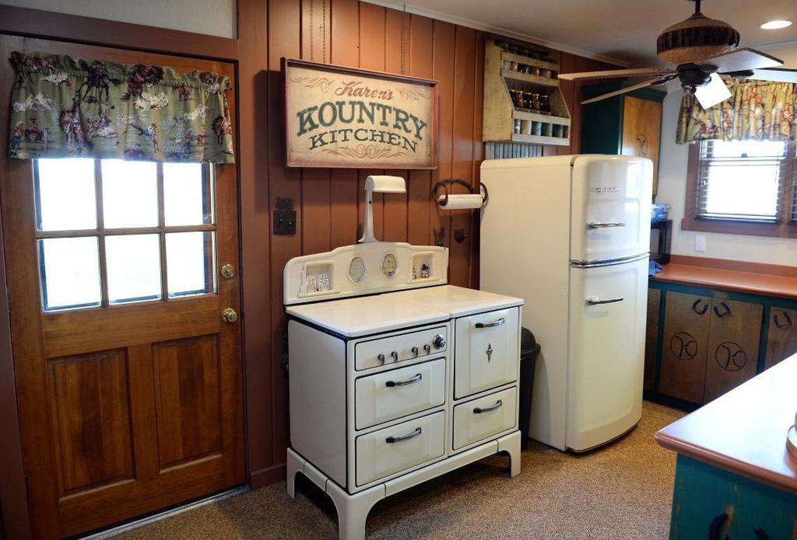 The kitchen at Karen Perez’ Hanford home features old time appliances while carrying a western theme as it does throughout the home, as seen on Wednesday, Sept. 27, 2017.