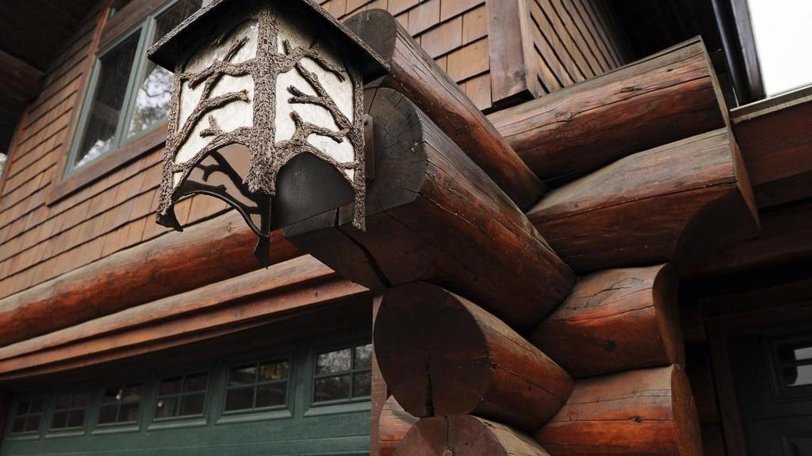 This house has a three-sided fireplace, wine cellar with vault and heated dog kennel