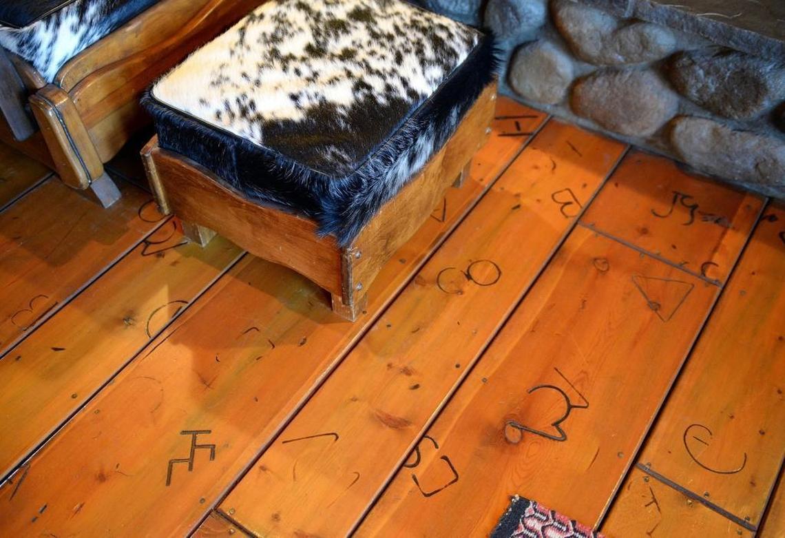 The wood floor in the great room at Karen Perez’ home features burnt-in brands that she did with some help with friends, as seen on Wednesday, Sept. 27, 2017.
