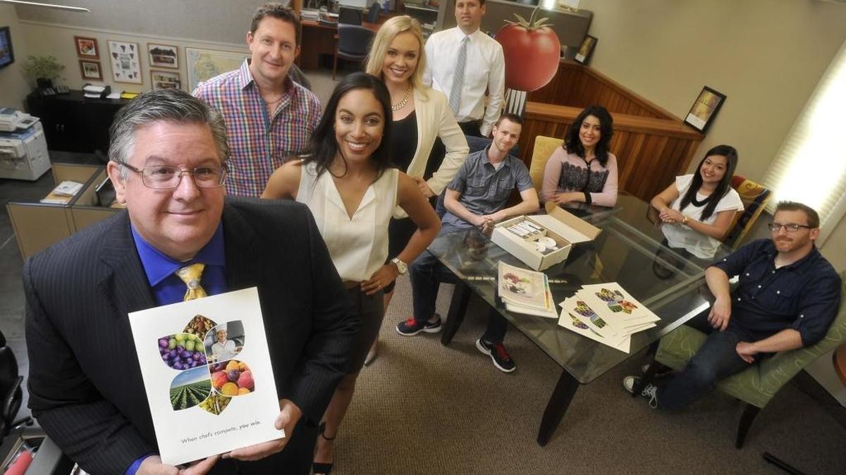 
Culinary Competitions International CEO Peter DeYoung, left, and his staff in March as the company was getting started. Now, it’s expanding to China.
