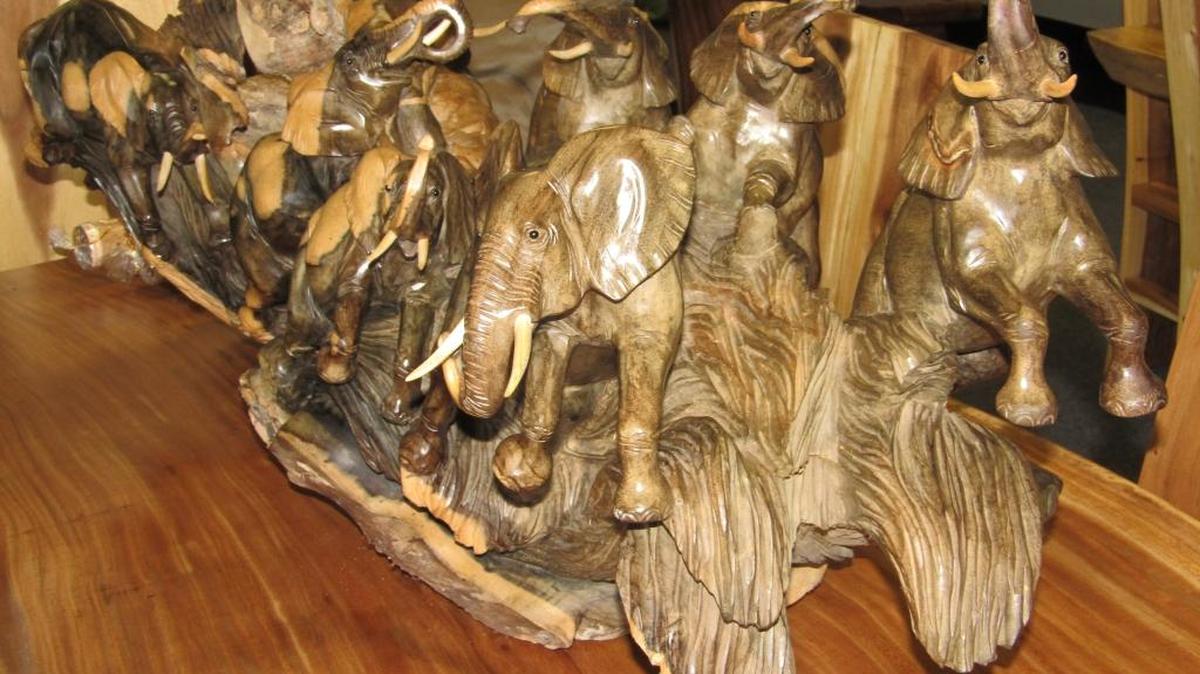 A hand-carved elephant sculpture for sale at Timeless Treasures Unique Home Decor in Clovis.