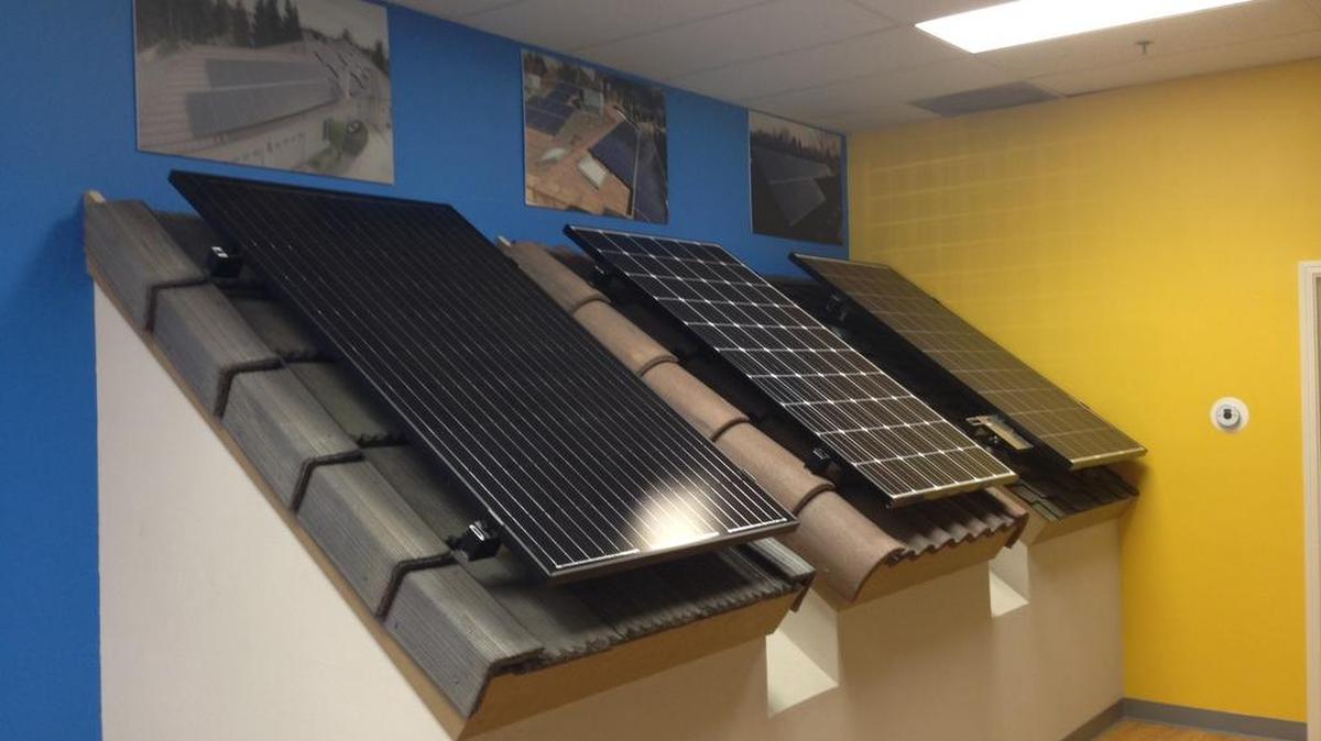 
The Bland Solar & Air showroom’s display of rooftop solar panels.
