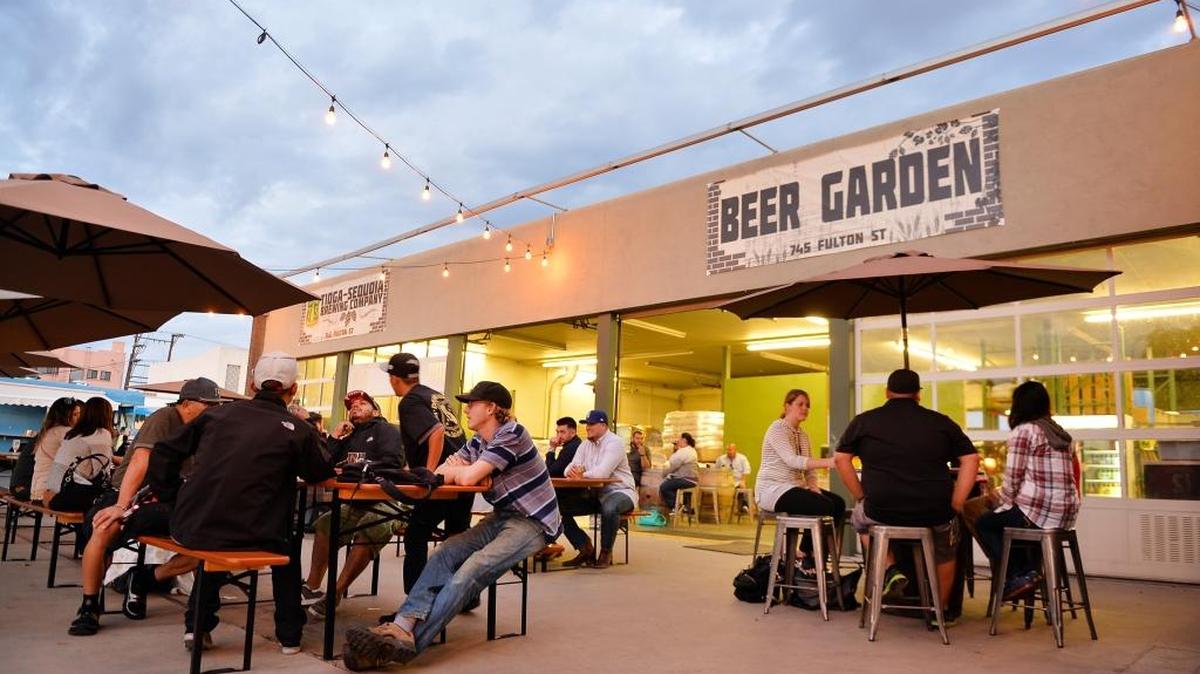 The beer garden at Tioga-Sequoia Brewing Company in downtown Fresno. Tioga-Sequoia has purchased the former Team Amvets Thrift Store nearby at Inyo and Broadway streets to expand production.