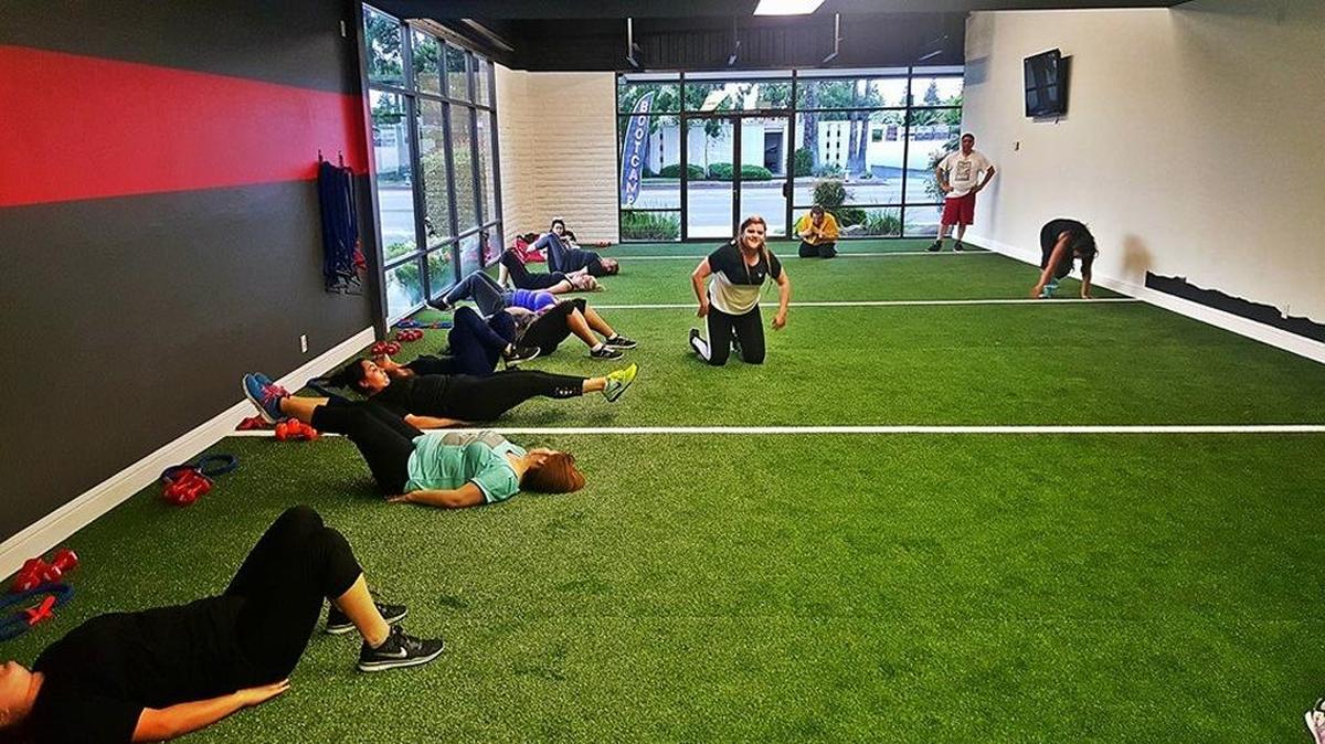 A group works out at Queen Camp Bootcamp in Fresno.