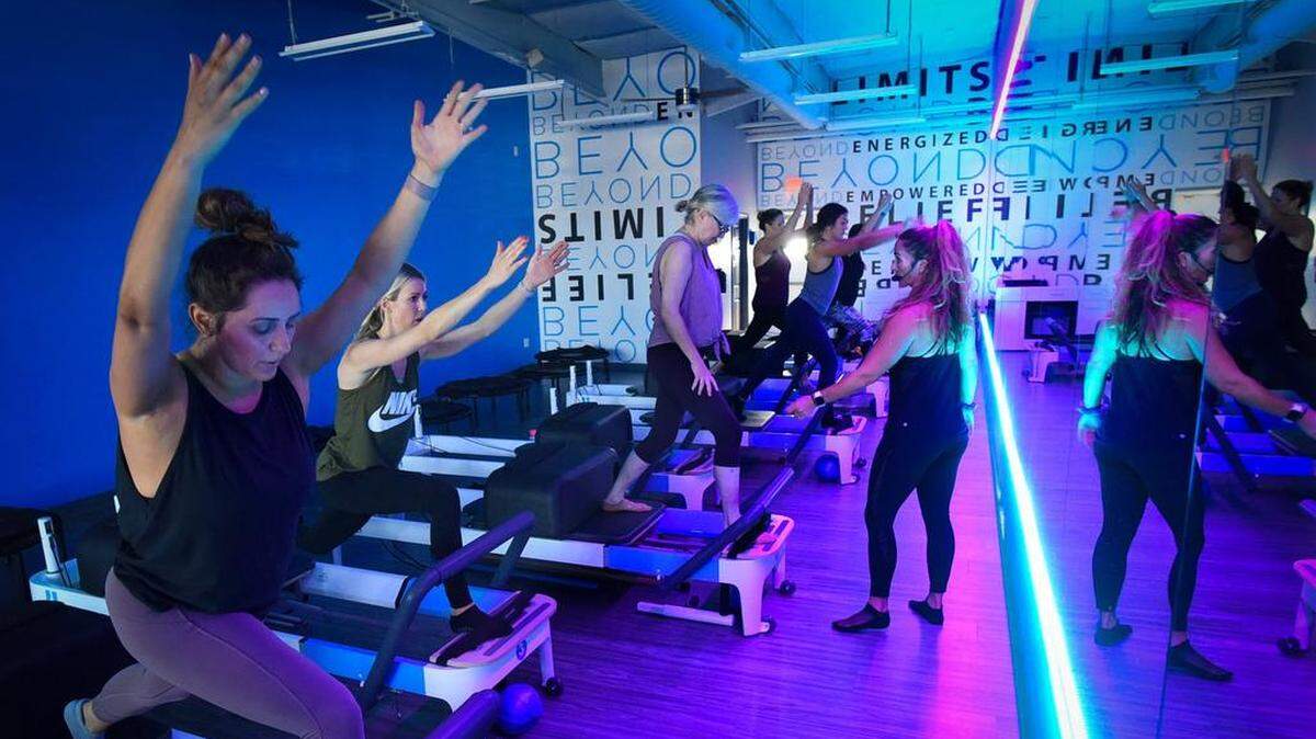 At Beyond Pilates Studio in Fresno, instructor Heather McCann, center, leads exercises on Aug. 17, 2018. Fresno is one of the 10 worst cities for an active lifestyle, according to a new WalletHub study.
