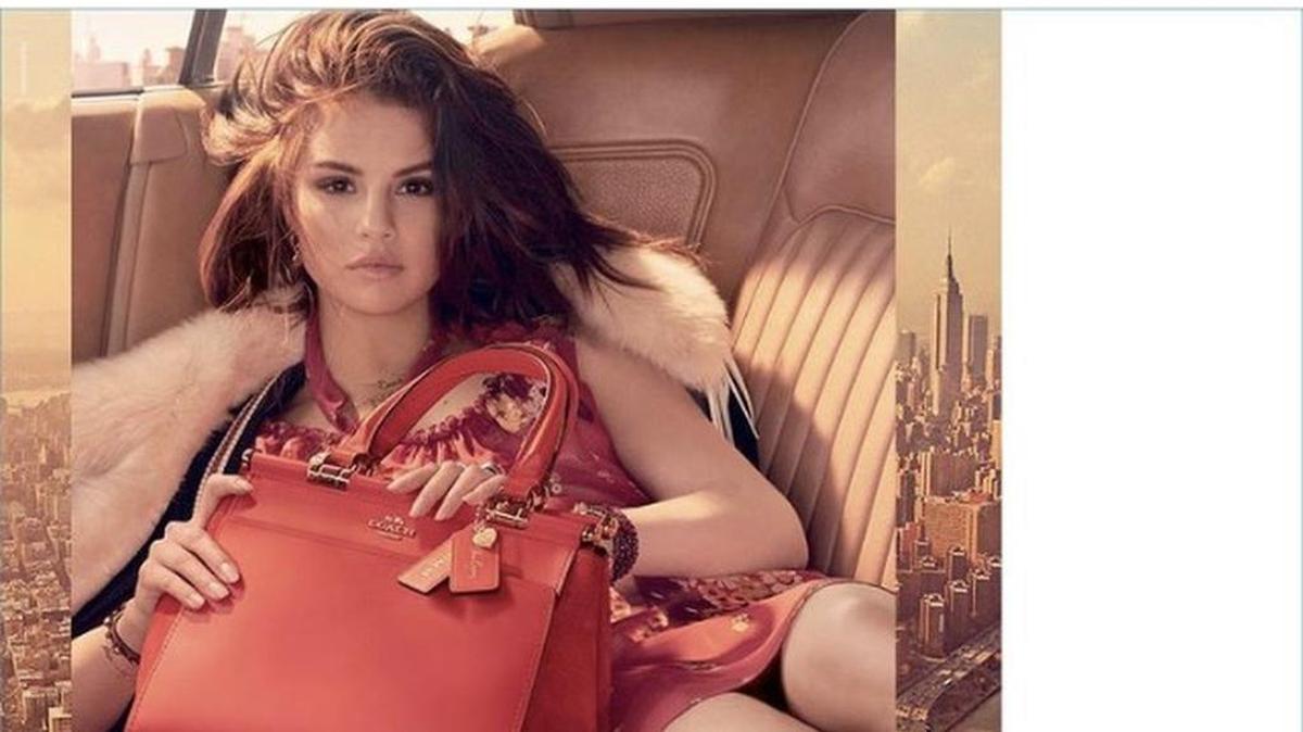 Pop singer Selena Gomez has teamed up with Coach to create an accessory line. The “Selena Grace” handbags come in three colors and online pre-orders begin Monday.