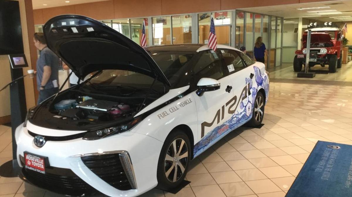The 2016 Toyota Mirai, a hydrogen fuel cell electric vehicle, is on display in the showroom of the Roseville Toyota dealership in the Roseville Automall.