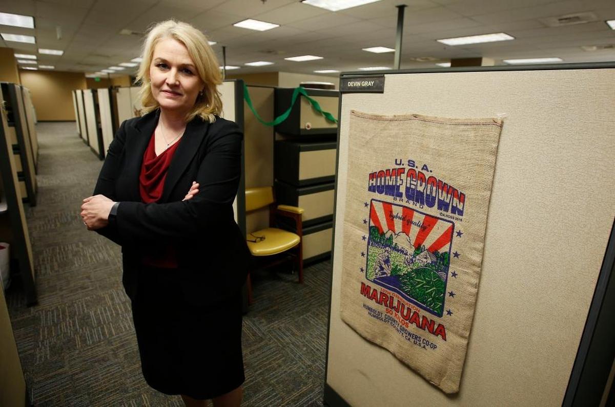 Lori Ajax, chief of California’s Bureau of Medical Cannabis Regulation, poses in the bureau’s office in Sacramento. Ajax and her staff are crafting regulations and rules that will govern the state’s emerging legal pot market, from where and how plants can be grown to setting guidelines to track the buds from fields to storefront.