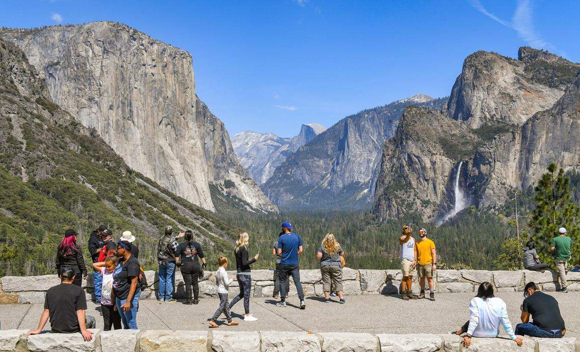 Visitors take in the splendor of Yosemite Valley in spring at Tunnel View in Yosemite National Park on Friday, April 23, 2021.