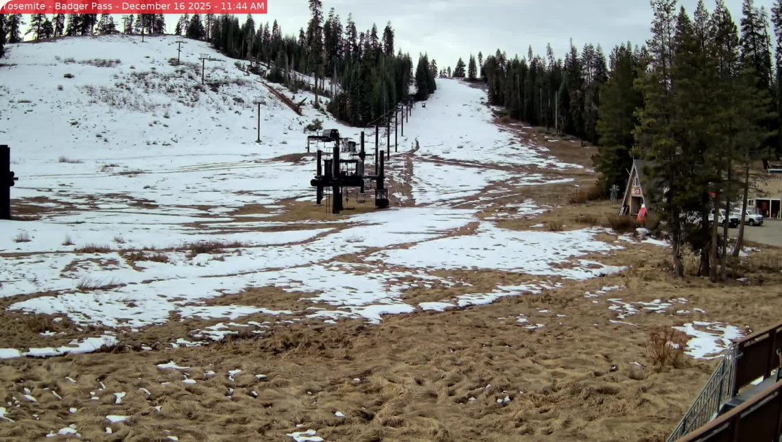 Large swaths of brown earth were visible beneath a sparse covering of snow on the area’s live webcams as of Dec. 16.