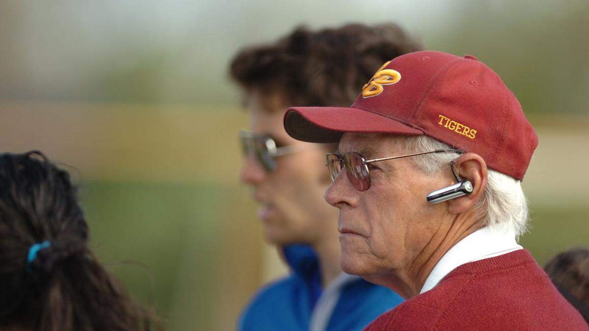 Los Banos girls’ varsity soccer coach Larry Goodger, front, and JV coach Wes Wing, back, prepare for their respective matches against Patterson Monday at Loftin Stadium, their last home games of the 2011 season.