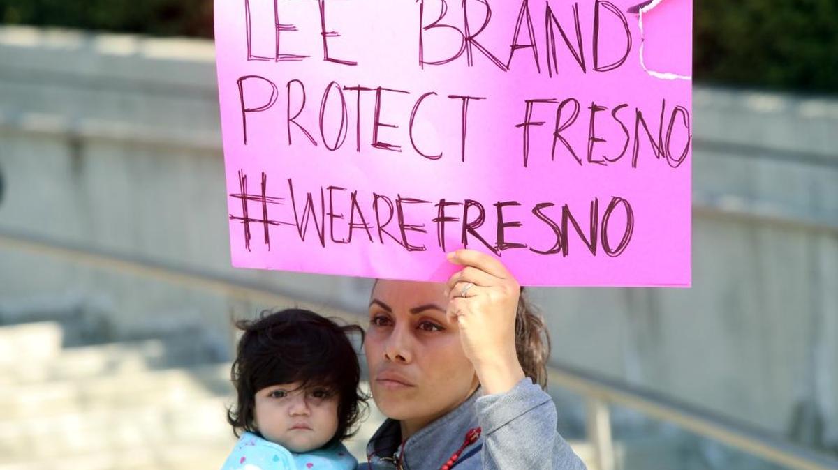 Naturalized U.S. citizen Martha Avalos and her 4-year-old daughter Valeria Vázquez attend a rally in front of Fresno City Hall in January calling on Fresno Mayor Lee Brand to stand with the undocumented community.