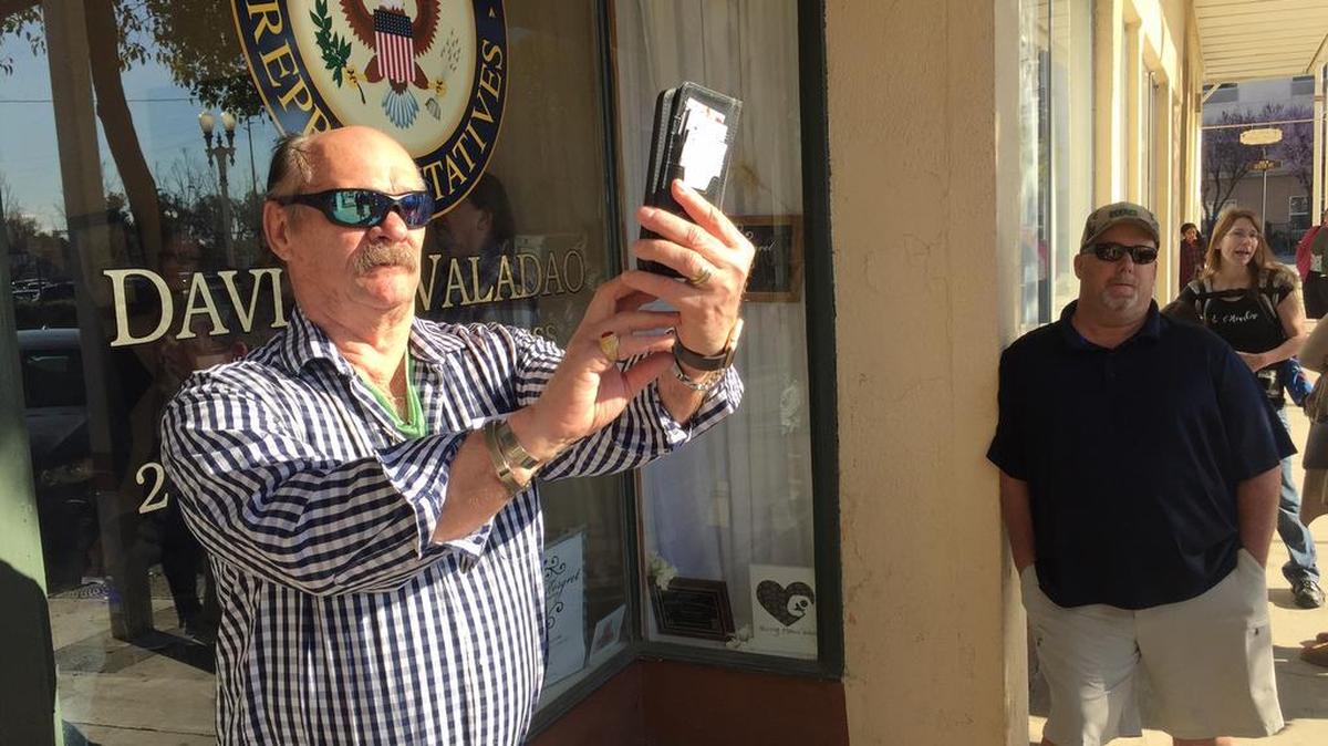 Ron Hill of Coalinga takes a selfie in front of the office of Congressman David Valadao, R-Hanford, on Monday, March 6, 2017. Valadao was hosting a “Hometown Huddle” and met with constituents one-on-one rather than a town hall setting.