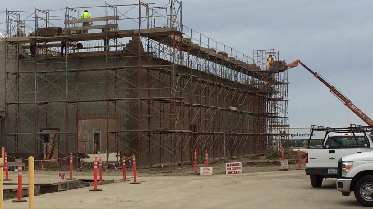 A new building is under construction at Lemoore Naval Air Station to house the F-35 Joint Striker Fighter squadron administration and maintenance departments.