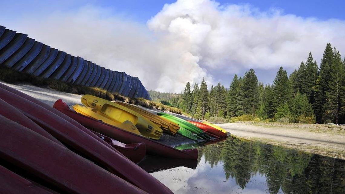 
Smoke from the Rough fire billows over Hume Lake on Aug. 19.
