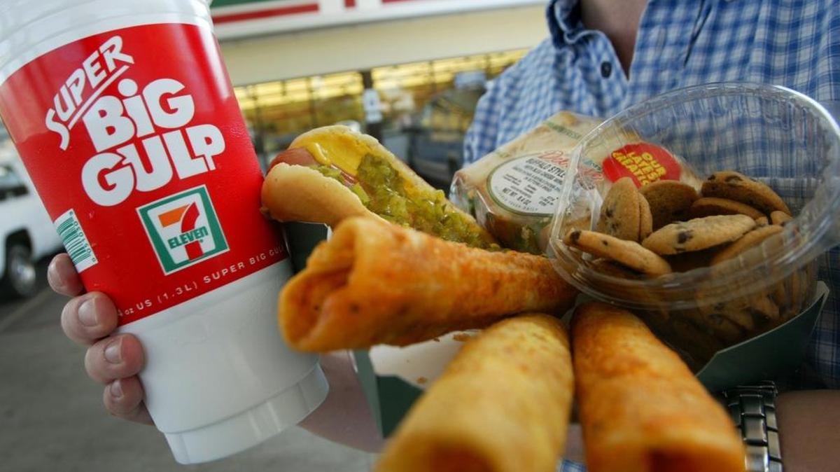 It’s National Junk Food Day. Here’s the ubiquitous 7-Eleven Big Gulp, with a hot dog, taquitos, a deli sandwich and chocolate chip cookies from 7-Eleven in Fort Worth, Texas.