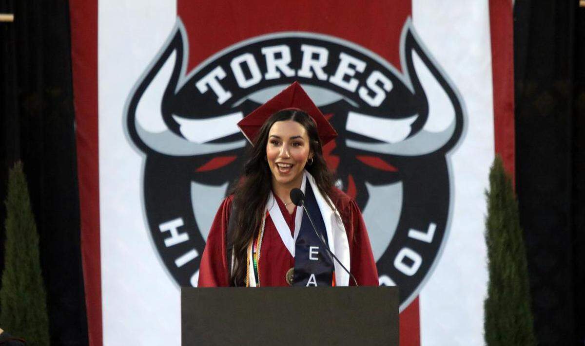 Ashley Cendejas delivered a speech during the first graduation ceremony for Matilda Torres High School at Madera Memorial Stadium on June 10, 2023.